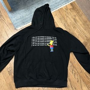 Black Graphic Pullover Hoodie with Repeating Text and Character Accent
